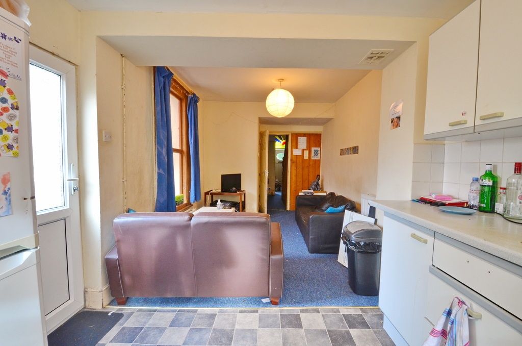 Property photo 3 of 9 Bright Open-Plan Living Area With A Comfortable So...