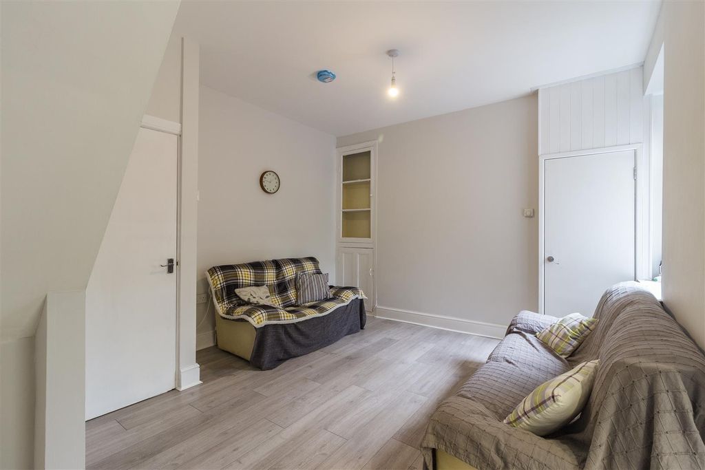 Property photo 3 of 9 Bright Lounge With Modern Flooring And Sofas...