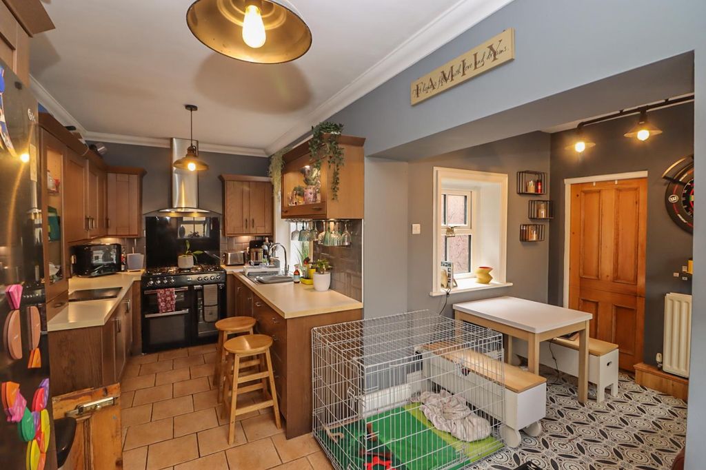 Property photo 3 of 16 Dining Kitchen