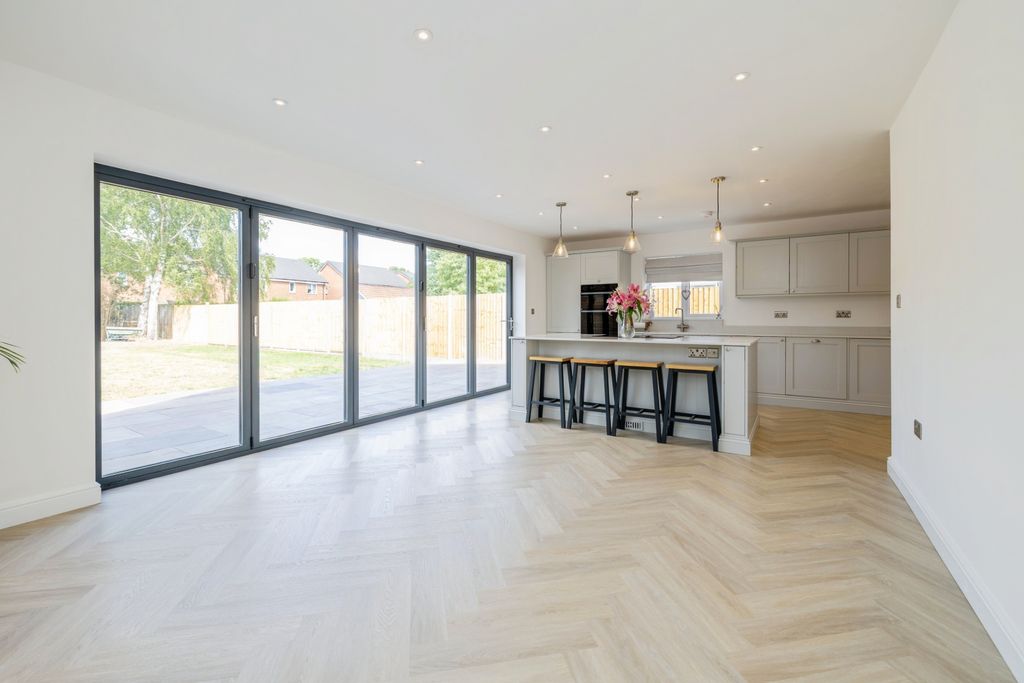 Property photo 3 of 25 Kitchen/Dining/Family Room