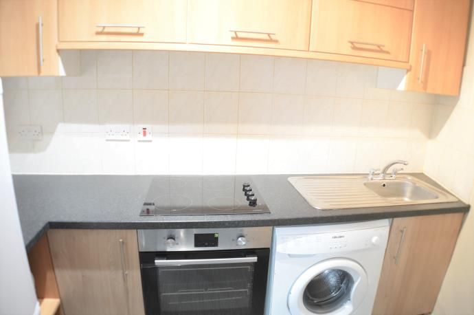 Property photo 2 of 6 Kitchen Area