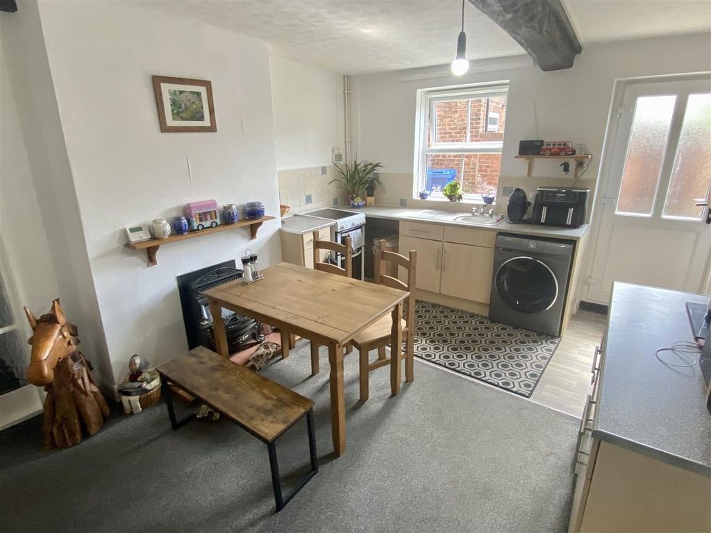 Property photo 2 of 7 Bright Kitchen With A Charming Dining Area...