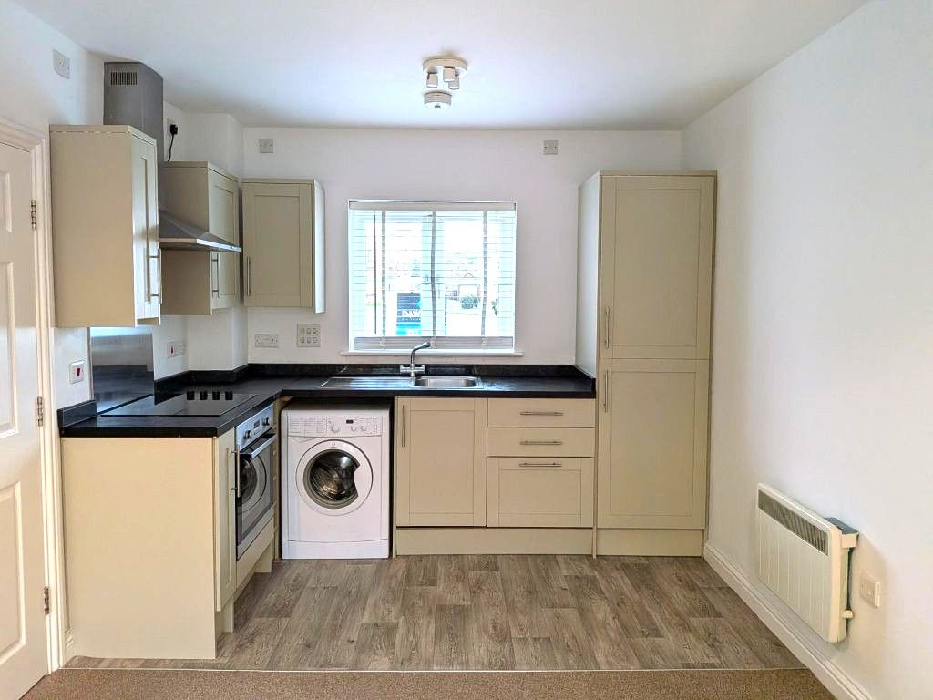 Property photo 3 of 7 Kitchen