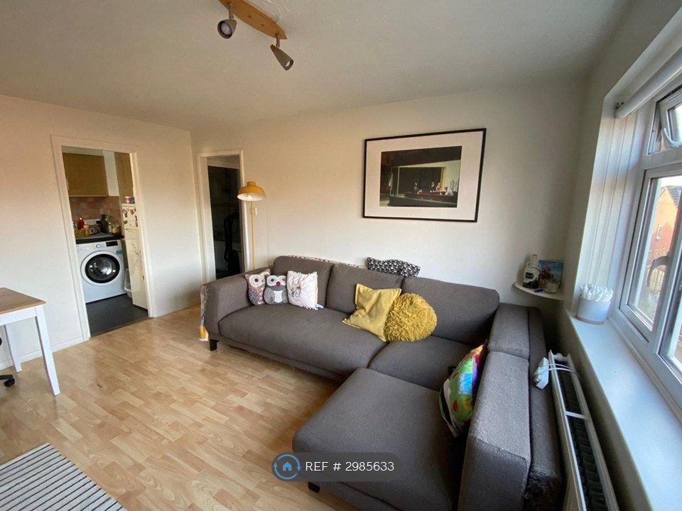 Property photo 1 of 12 The Living Room Is Bright And Airy