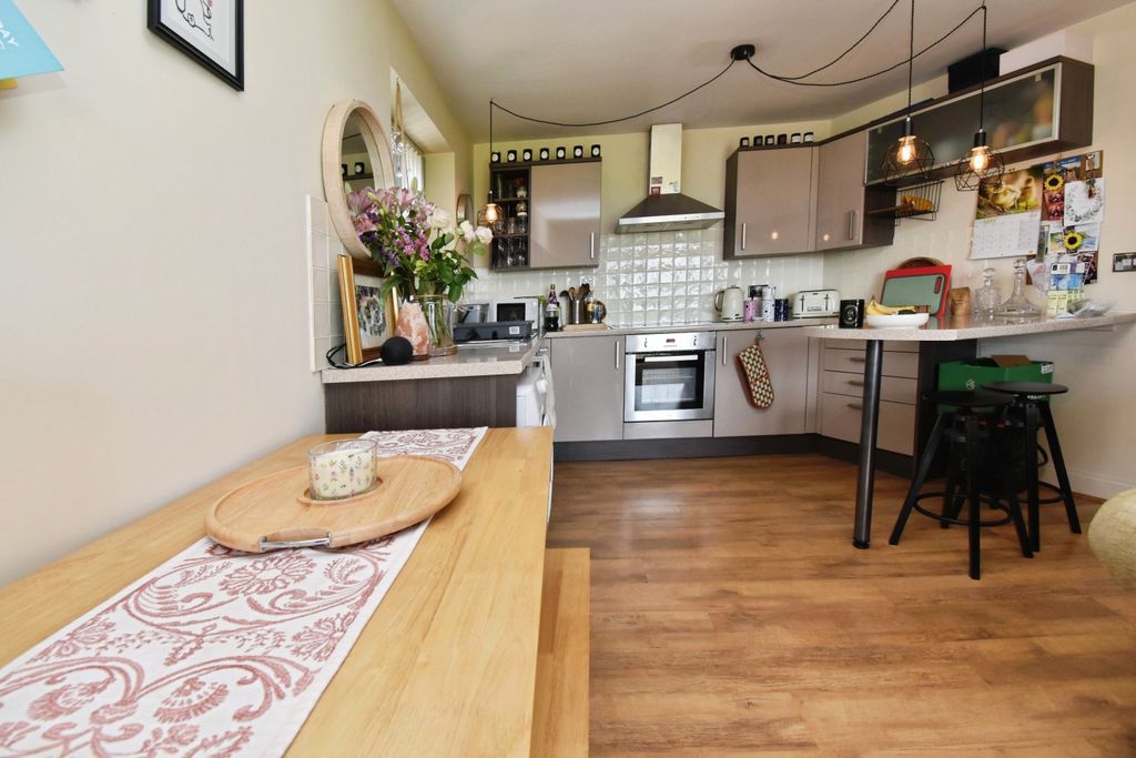 Property photo 2 of 12 Kitchen Area