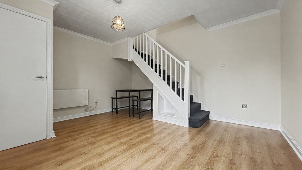 Property photo 2 of 10 Bright, Clean Living Room With Wood-Effect Floorin...