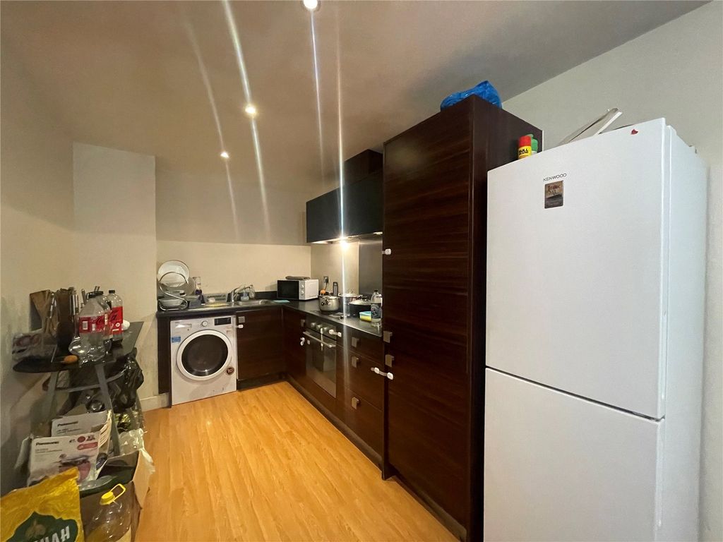 Property photo 3 of 4 Kitchen Area