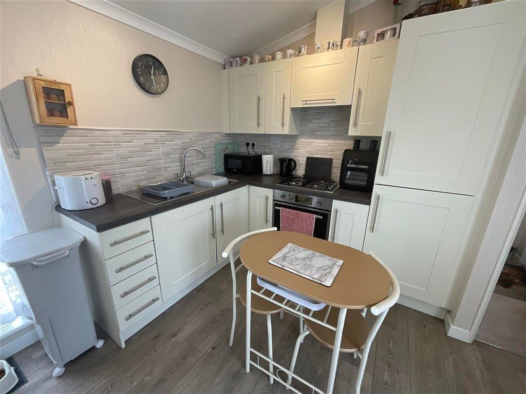 Property photo 3 of 8 Kitchen Area