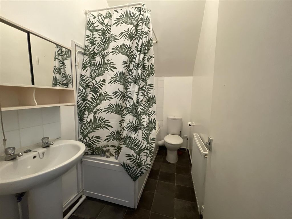 Property photo 1 of 7 Bright Bathroom With Bath And Stylish Curtain...