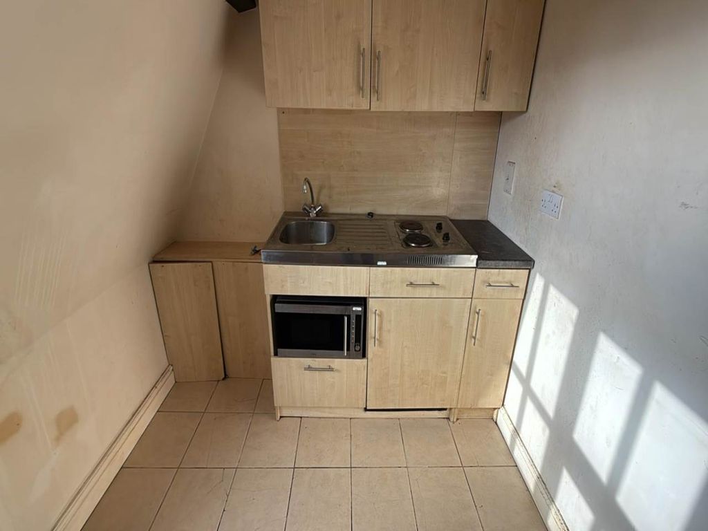 Property photo 3 of 8 Kitchen Area