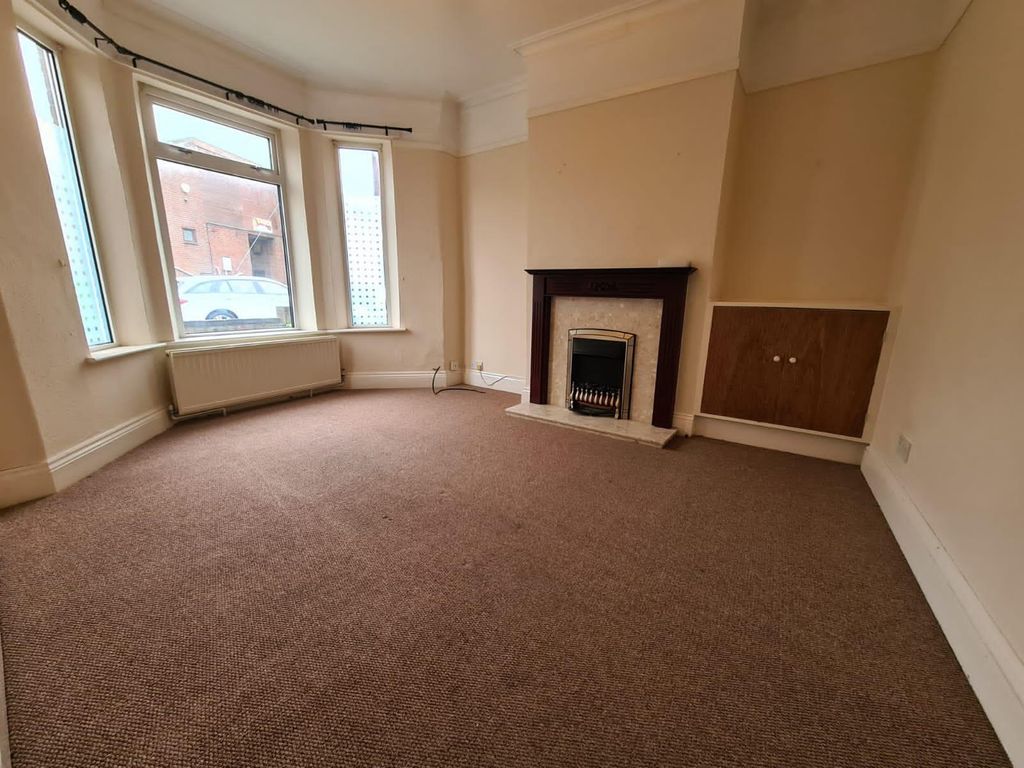 Property photo 2 of 12 Living Room