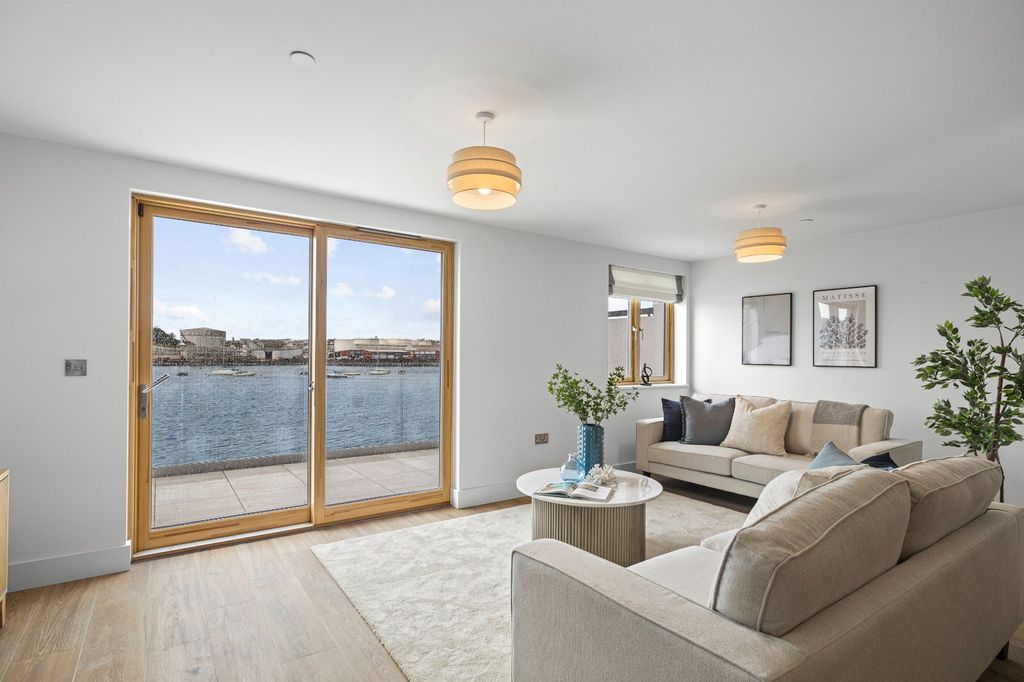 Property photo 3 of 12 Living Area