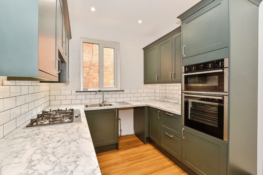 Property photo 3 of 12 Kitchen