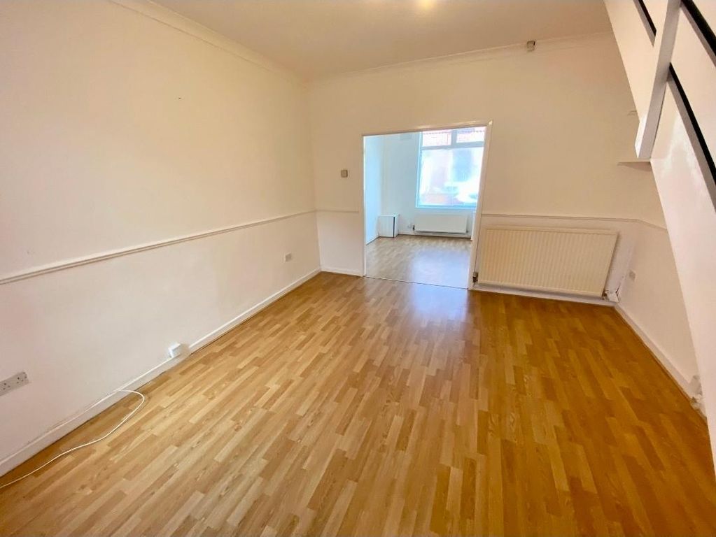 Property photo 1 of 10 Bright, Open-Plan Living Area With Warm Wood-Effec...