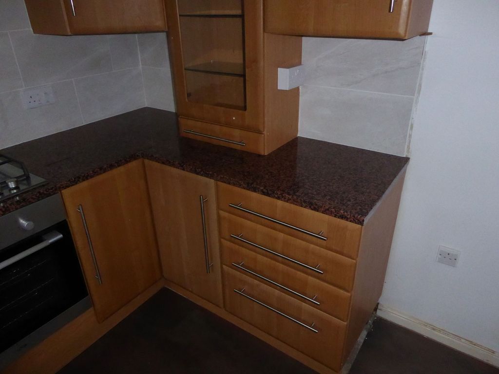 Property photo 3 of 12 Kitchen