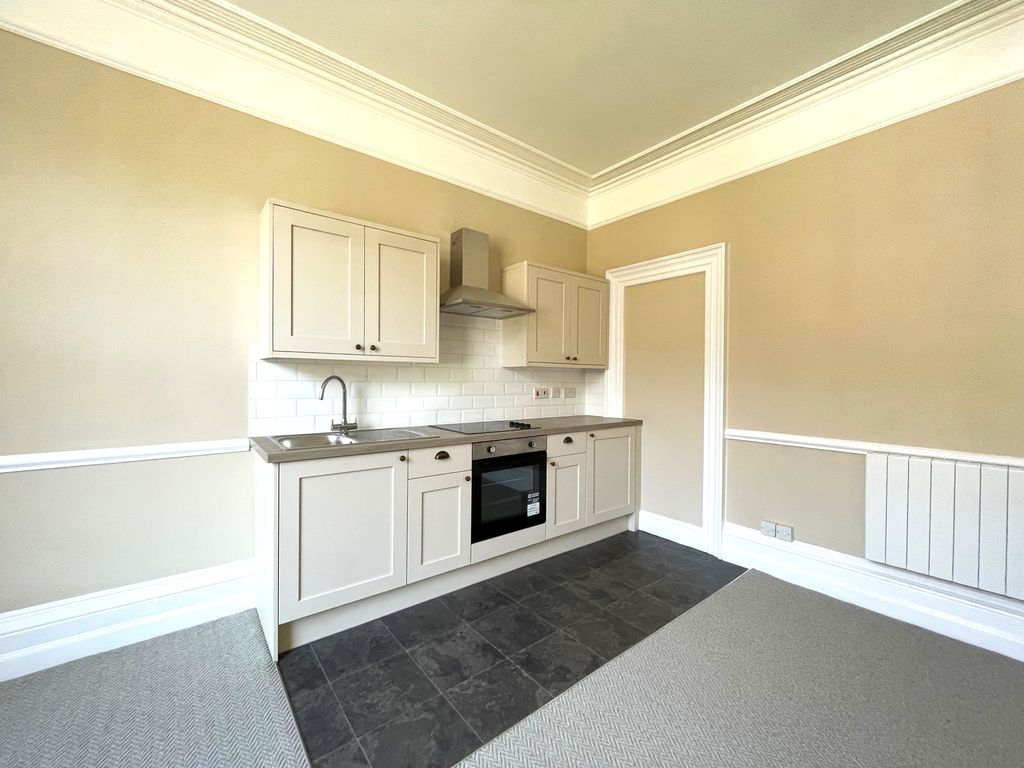 Property photo 3 of 7 Kitchen