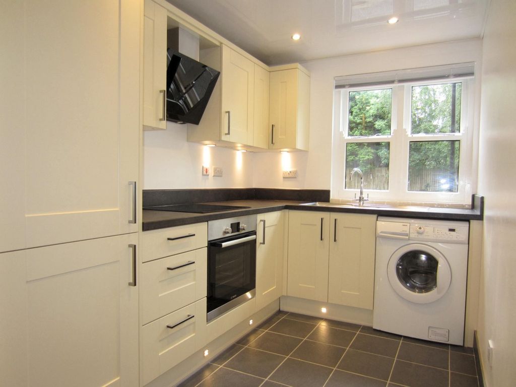 Property photo 3 of 7 Kitchen