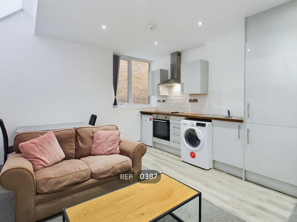 Property photo 1 of 12 Kitchen & Living Area