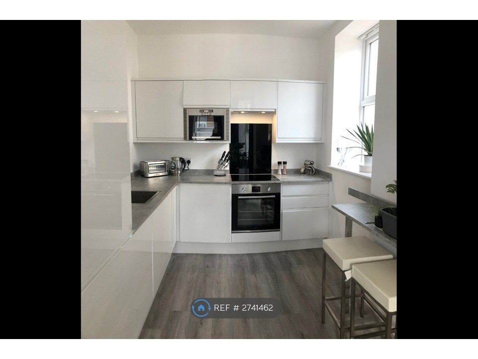 Property photo 3 of 13 Kitchen With Breakfast Bar
