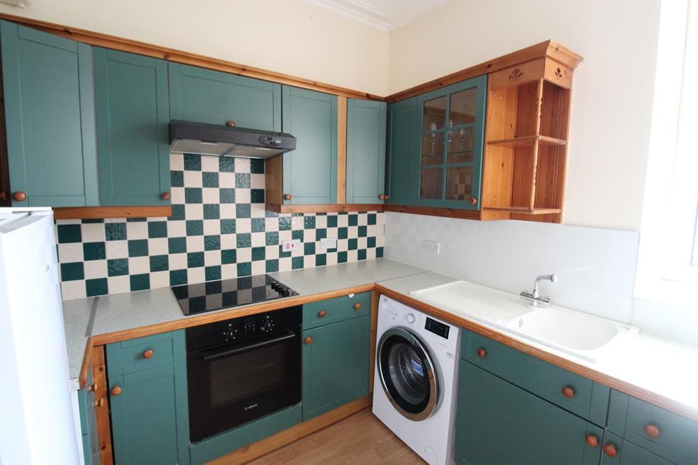 Property photo 3 of 8 Kitchen