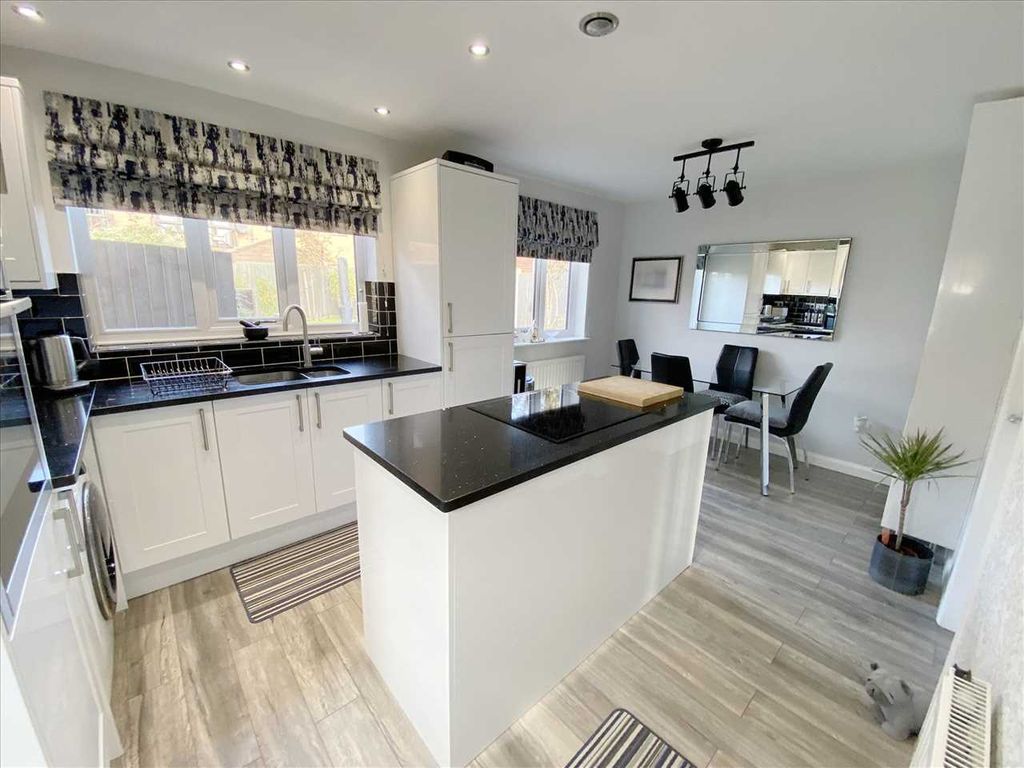 Property photo 3 of 8 Dining Kitchen:
