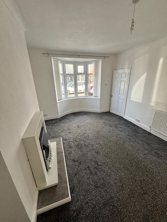 Property photo 3 of 12 Living Room