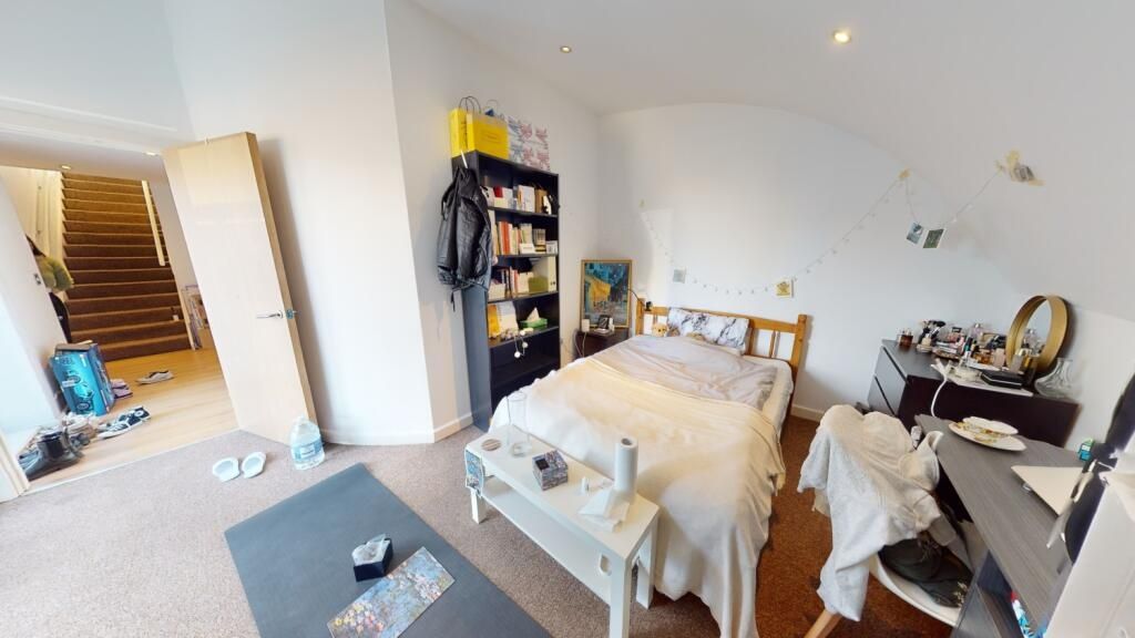 Property photo 1 of 5 A Spacious, Bright Master Bedroom Featuring A Comf...
