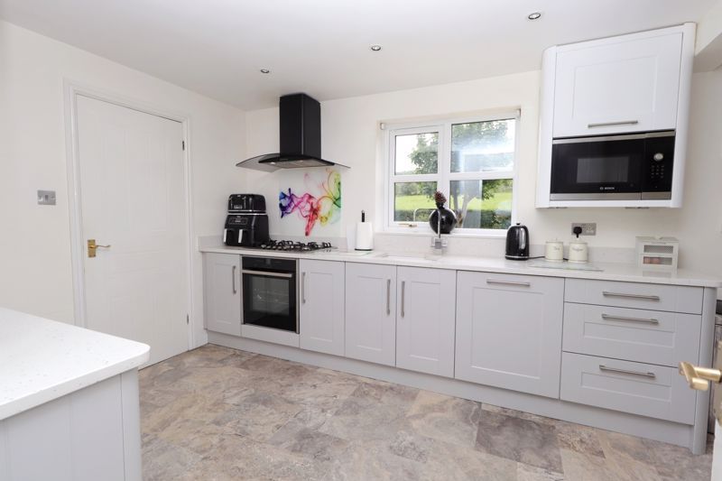 Property photo 3 of 34 Dining Kitchen