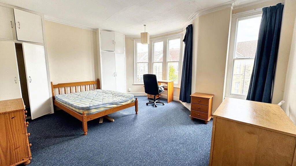 Property photo 2 of 12 Bright And Spacious Master Bedroom Featuring A Lar...