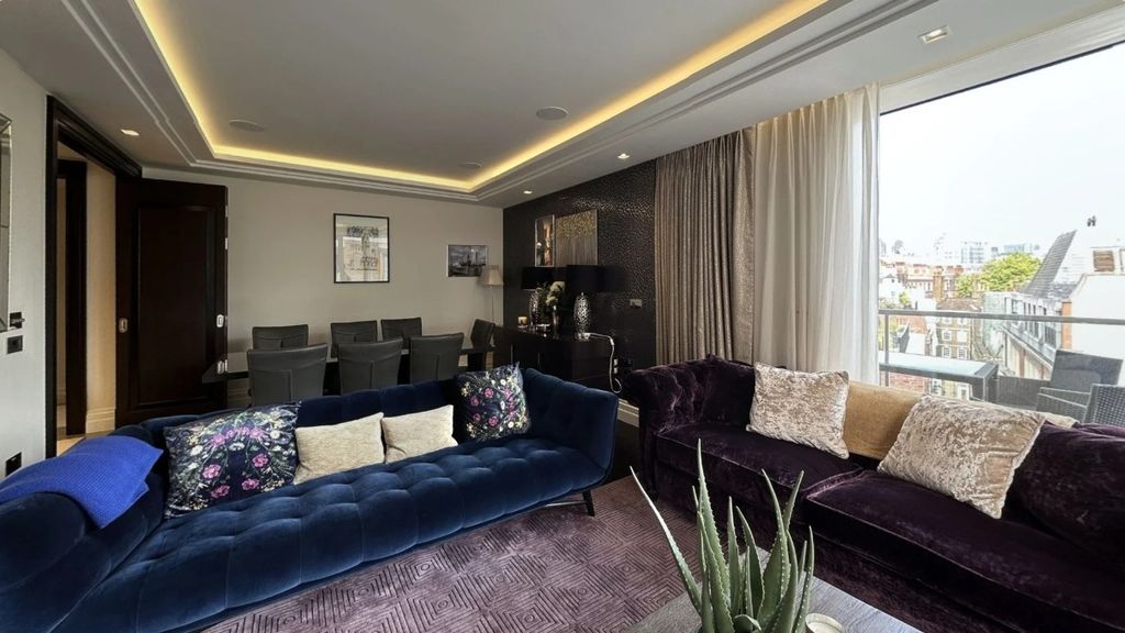 Property photo 2 of 24 A Stylish Contemporary Living Room Featuring Plush...
