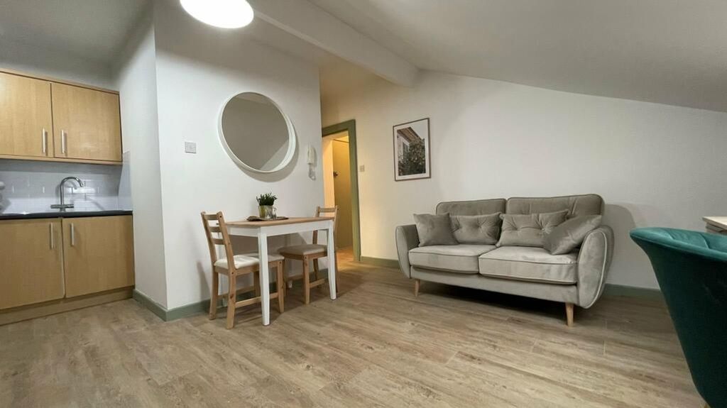 Property photo 1 of 7 A Spacious And Inviting Modern Living Room Featuri...