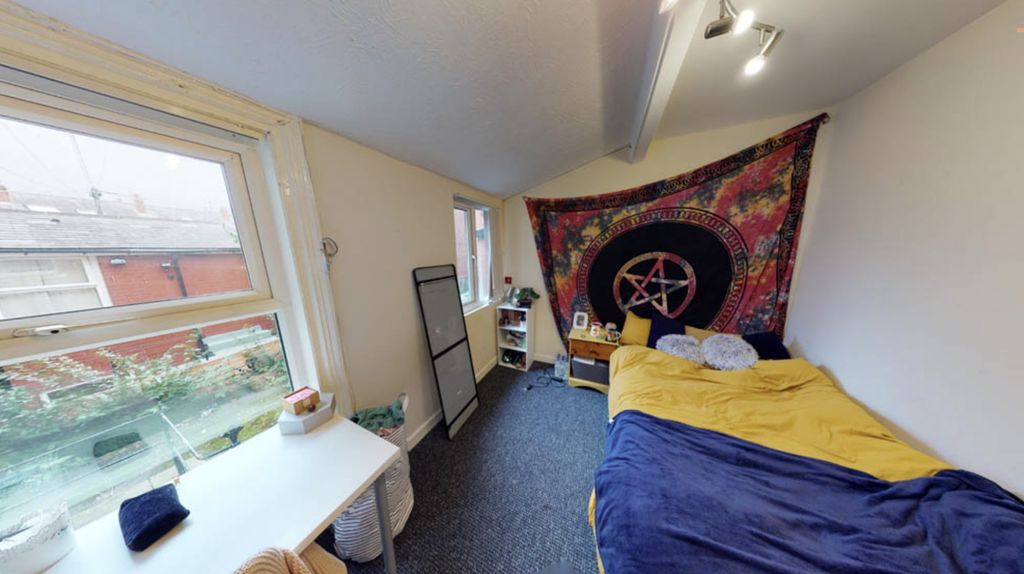 Property photo 2 of 6 A Bright And Inviting Bedroom With Natural Light c...