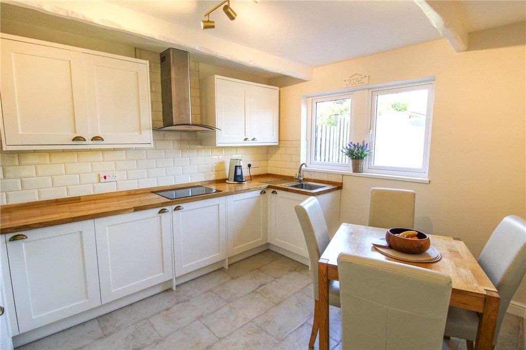 Property photo 3 of 16 Dining Kitchen