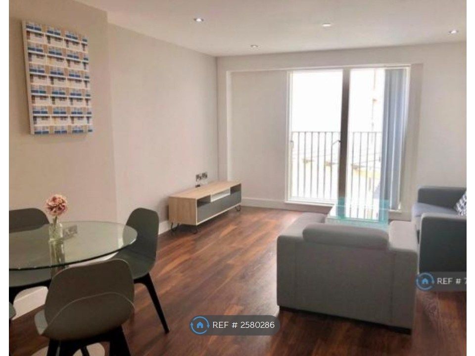 Property photo 2 of 9 Living Room With Balcony Doors