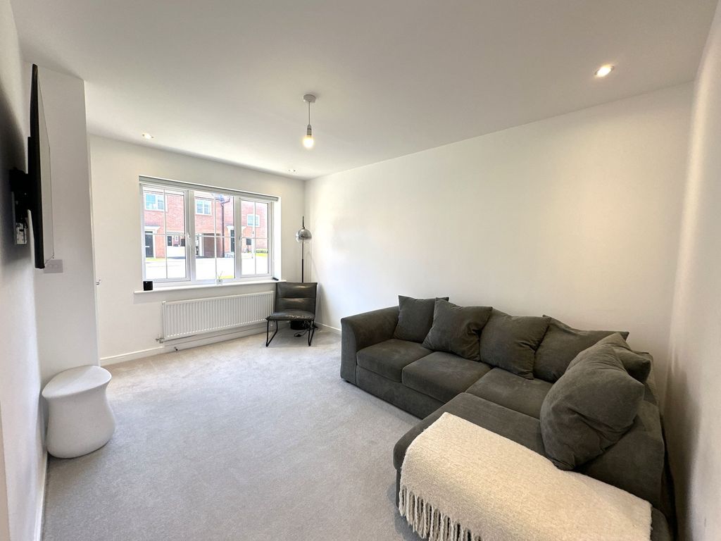 Property photo 3 of 12 Living Room