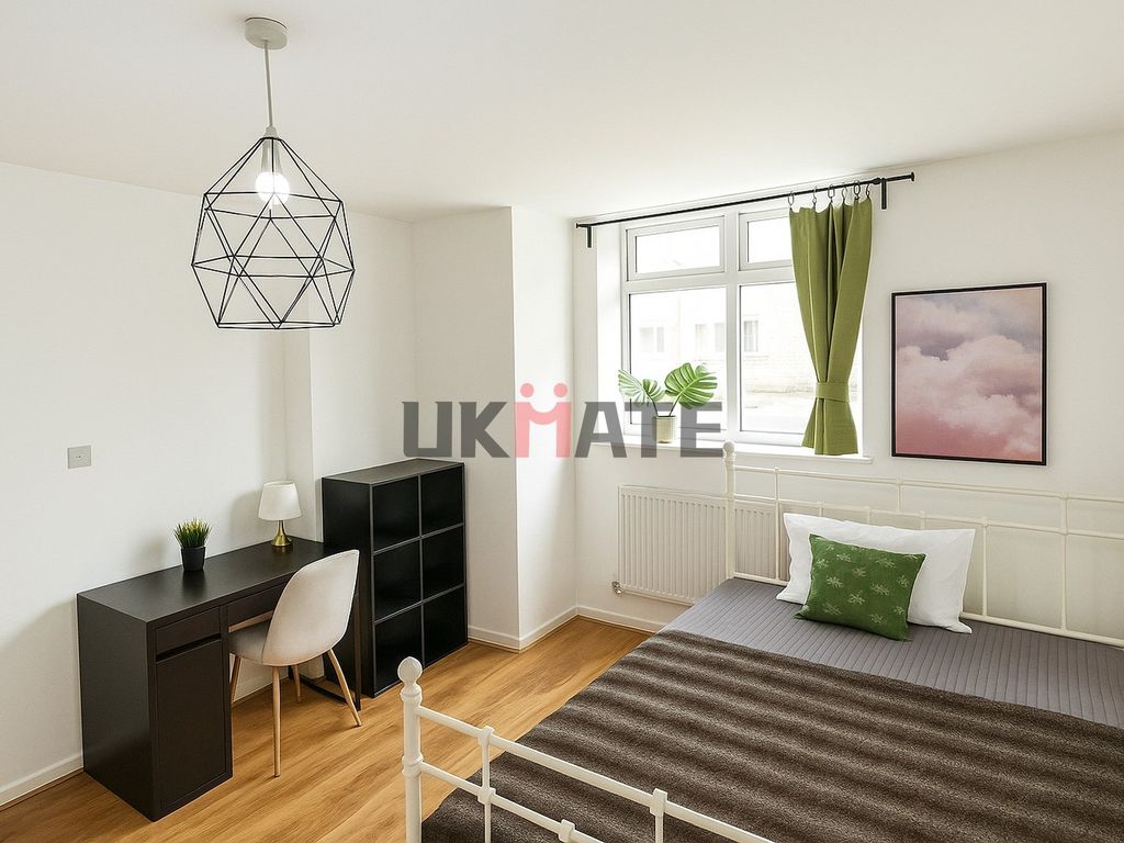 Property photo 2 of 20 Bright And Inviting Bedroom Featuring A Cozy Bed W...