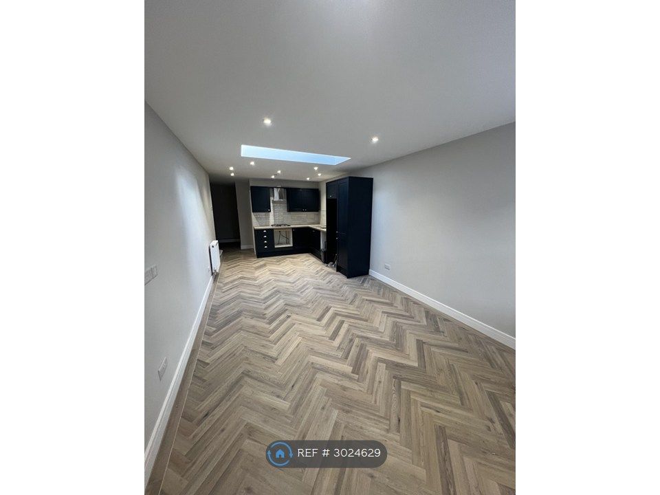 Property photo 2 of 12 Kitchen/Living Area
