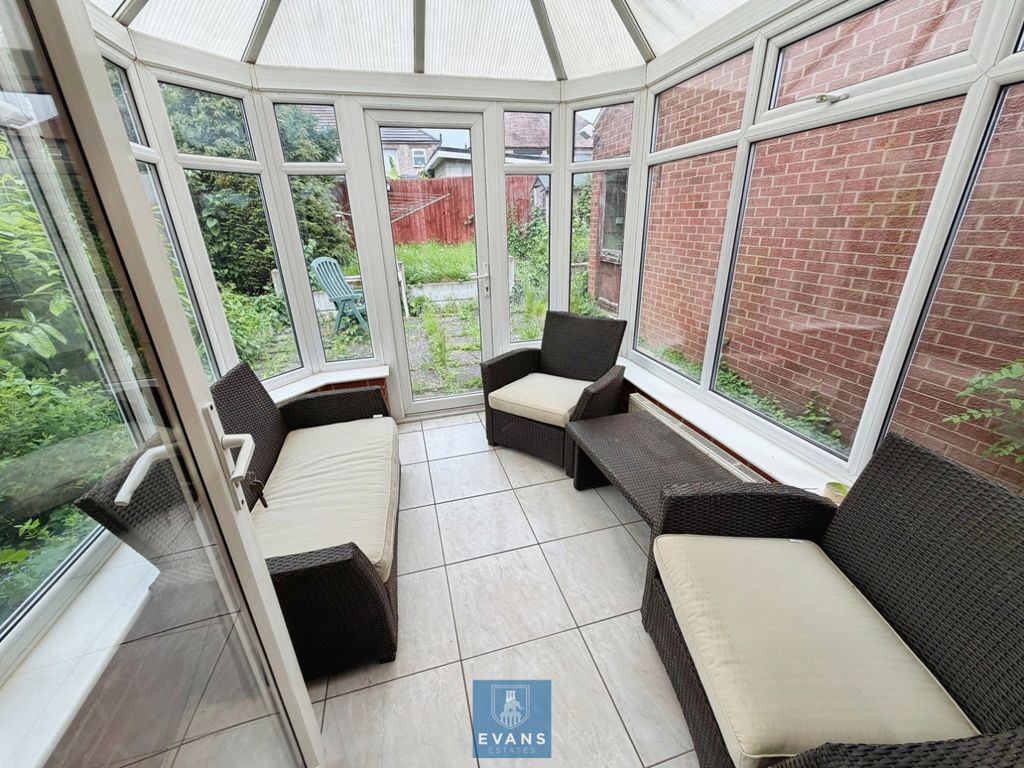 Property photo 3 of 12 Conservatory