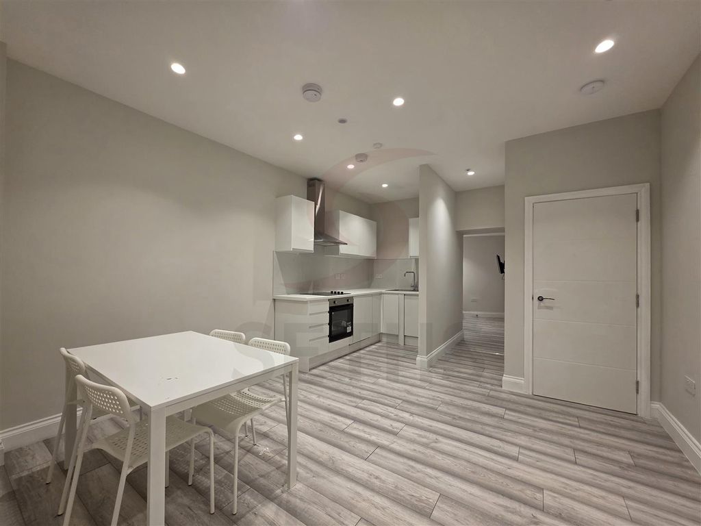 Property photo 1 of 9 Dining Room And Kitchen