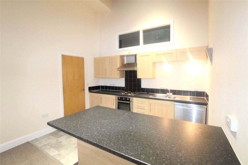 Property photo 3 of 15 Kitchen Area