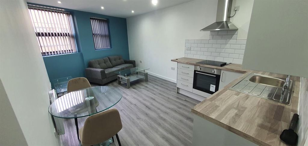 Property photo 1 of 8 Bright Open-Plan Living Area With Modern Kitchen U...