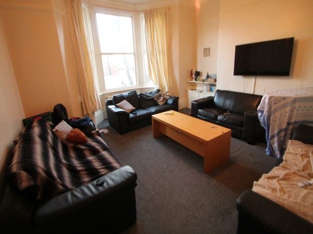 Property photo 2 of 14 A Spacious And Welcoming Living Room With Ample So...