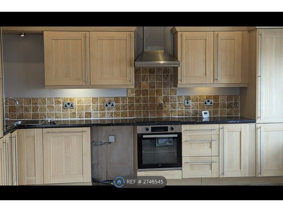 Property photo 1 of 15 Kitchen/Living Area