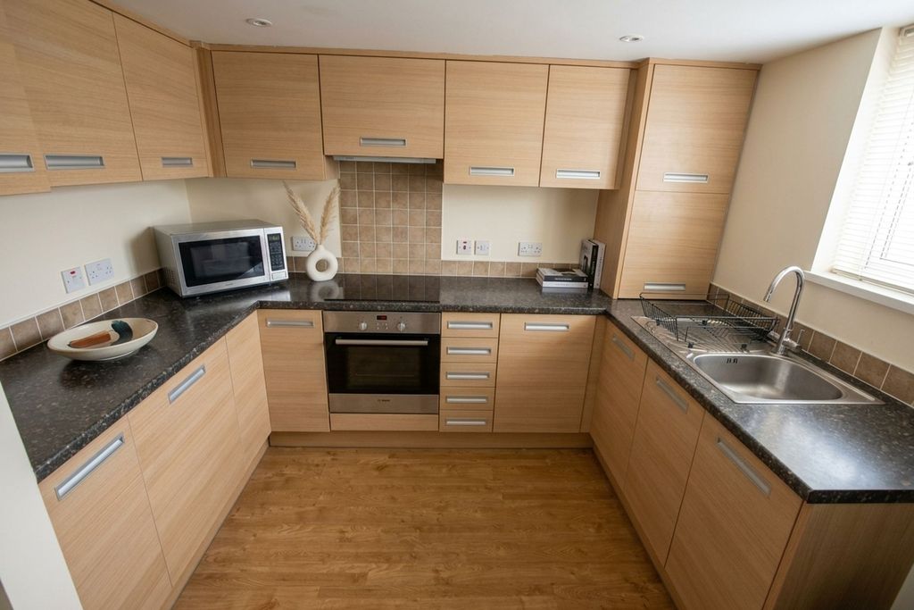 Property photo 3 of 13 Kitchen