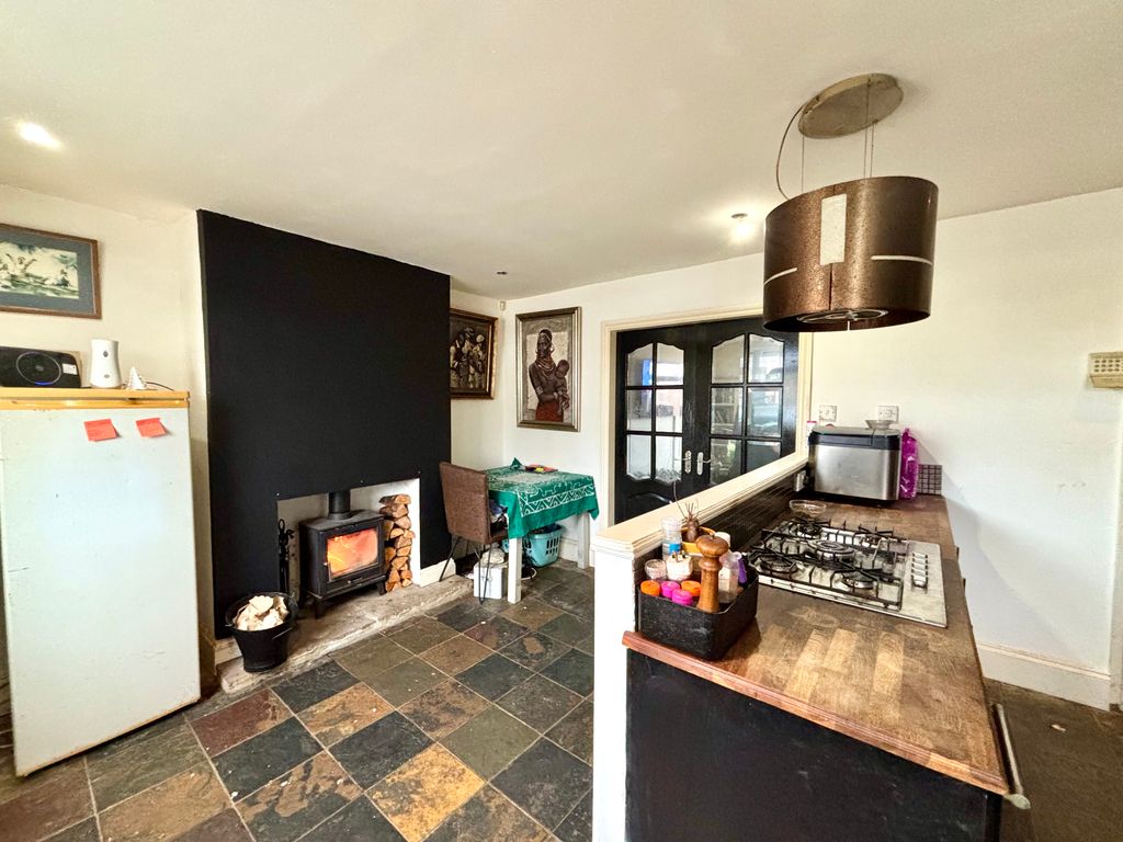 Property photo 2 of 13 Dining Kitchen