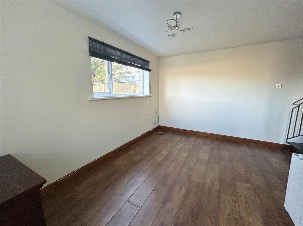 Property photo 2 of 9 Living Area