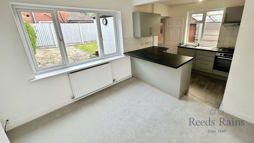 Property photo 3 of 15 Dining Kitchen