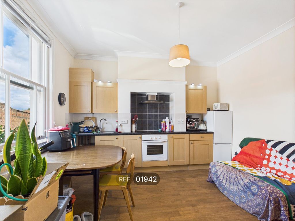 Property photo 2 of 9 Kitchen &amp; Living Area