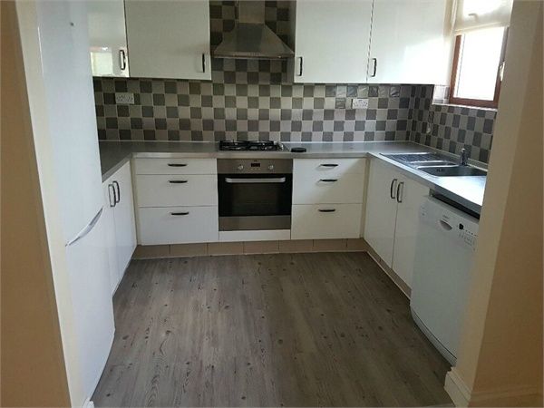 Property photo 3 of 8 Kitchen