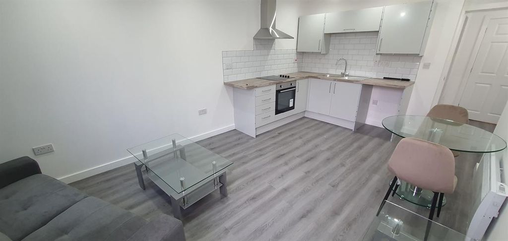 Property photo 3 of 11 Bright Open-Plan Kitchen And Living Area...